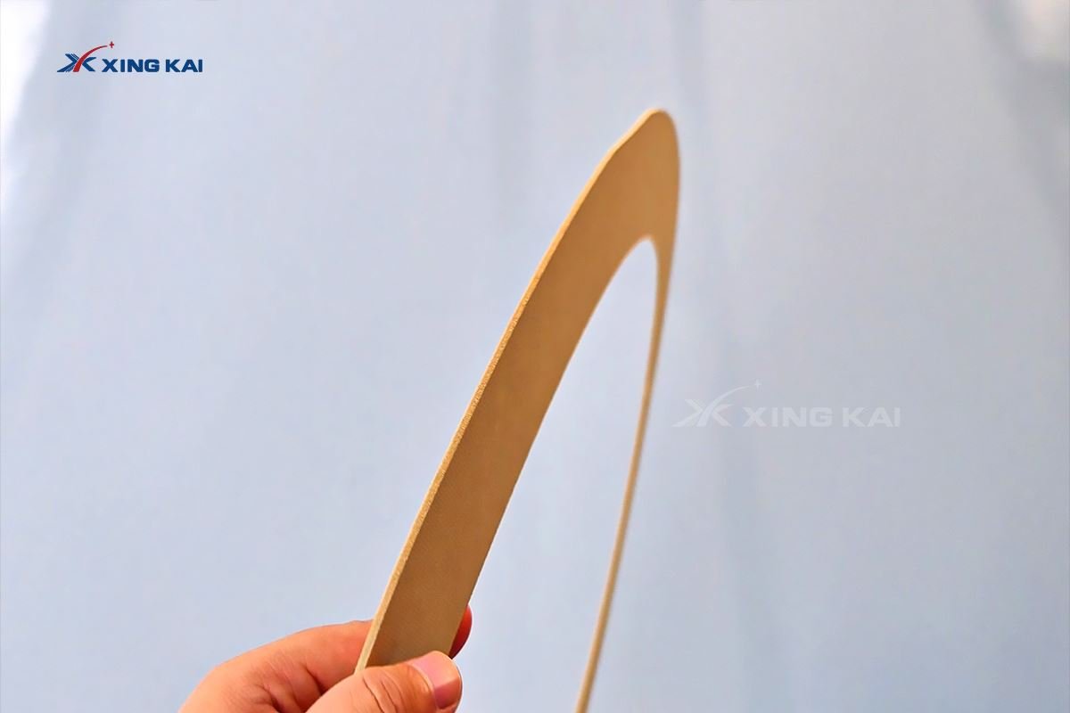 Precision cut kraft paper part