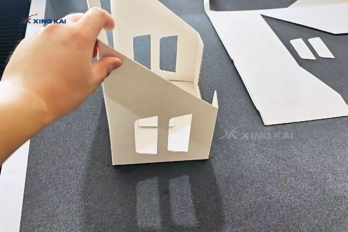 Folded cardboard box sample cut with a CNC oscillating knife