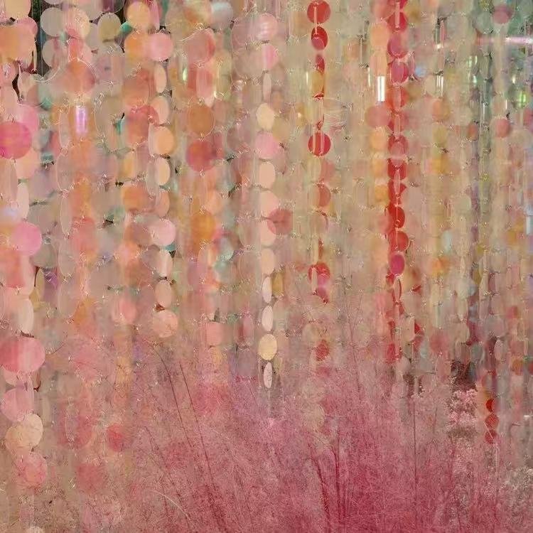 Close-up of a pastel sequin curtain backdrop for wedding decor