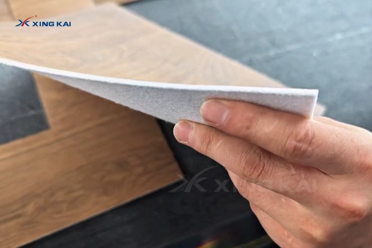 Cross section of flexible wood grain vinyl flooring material